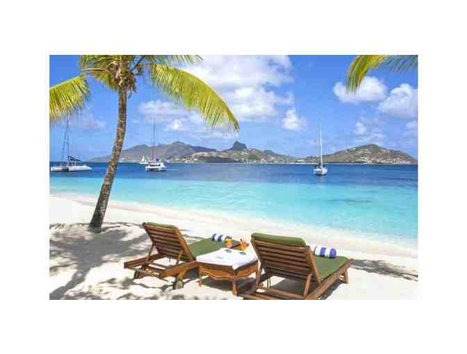 Palm Island, The Grenadines  Enjoys 7 nights of romantic beachfront resort accommodations