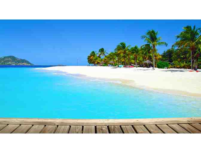 Palm Island, The Grenadines  Enjoys 7 nights of romantic beachfront resort accommodations