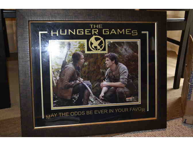 Hunger Games Framed Photo Signed by Jennifer Lawrence and Liam Hemsworth