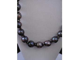 19' freshwater pearl necklace of metallic grey with sterling silver spacers and clasp