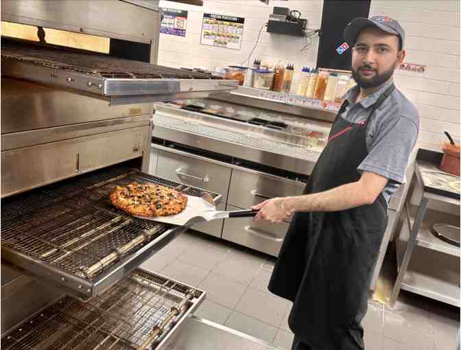 Domino's Savings Book a $20 Value for up to $200 in savings