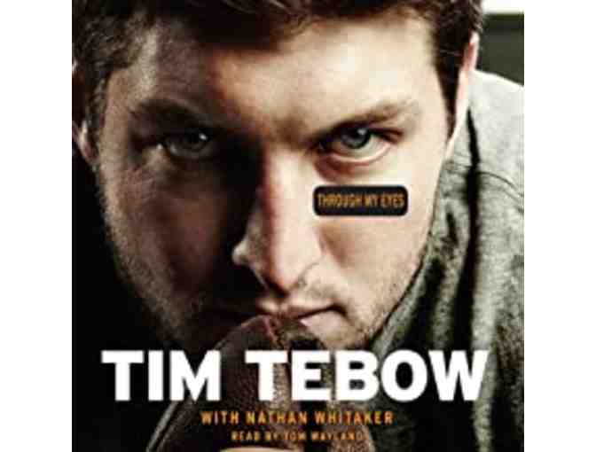 Tim Tebow Autographed Florida Gators Jersey and Autographed Tim Tebow Biography