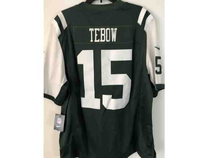Tim Tebow New York Jets Game Jersey by NIKE (size XL) & autographed biography