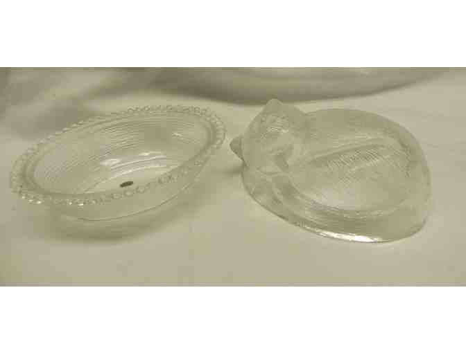 Collectible glass cat on nest