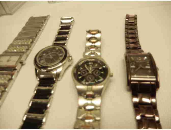 Four watches currently not working but worth getting batteries for