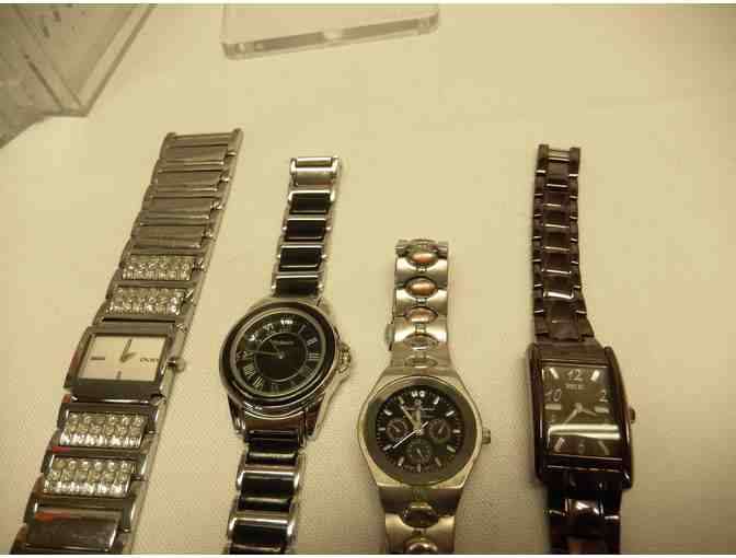 Four watches currently not working but worth getting batteries for