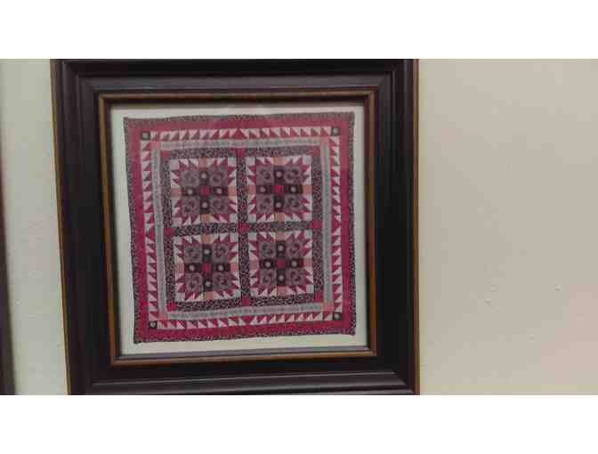 'Set of four miniature quilt prints, matted and framed, with glass.  Frame size 10 3/4 inc