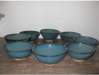 Set of 8 wheel-thrown ceramic bowls