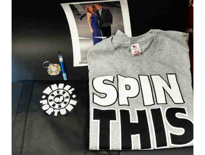 4 Tickets to Wheel of Fortune! With autographed picture & Tee Shirt, key chain, pen & bag
