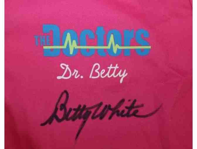 Pink Scrubs signed by Betty White from an episode of The Doctors