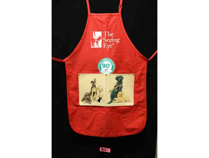 The Seeing Eye Red Grooming Apron with 90th Anniversary Logo and Leather Pocket