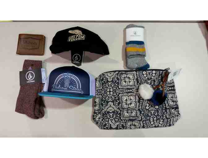 A Volcom Backpack, Baseball Hat and Pair of Socks