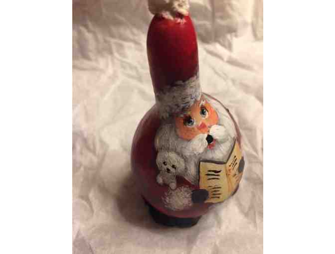 Gourd Carolers with Santa holding a Bichon.