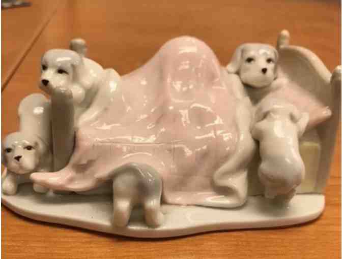 Doggies in bed figurine