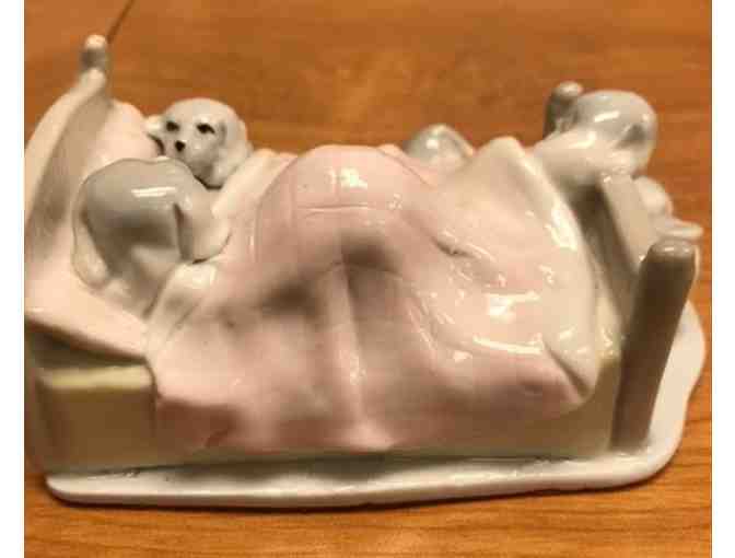 Doggies in bed figurine