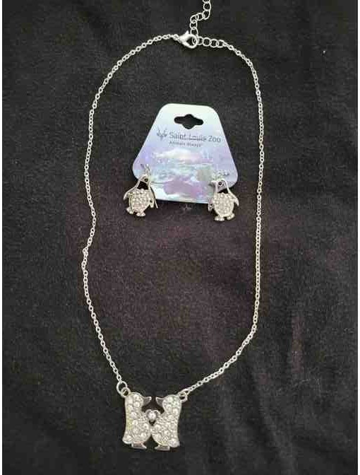 Silver Penguin necklace and earrings.