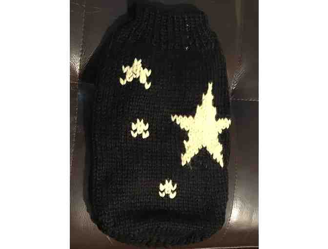 Black sweater with yellow stars