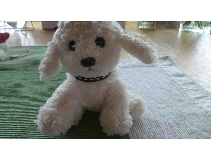 Small bichon stuffed dog