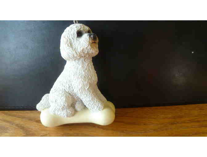 Bichon on a bone figurine