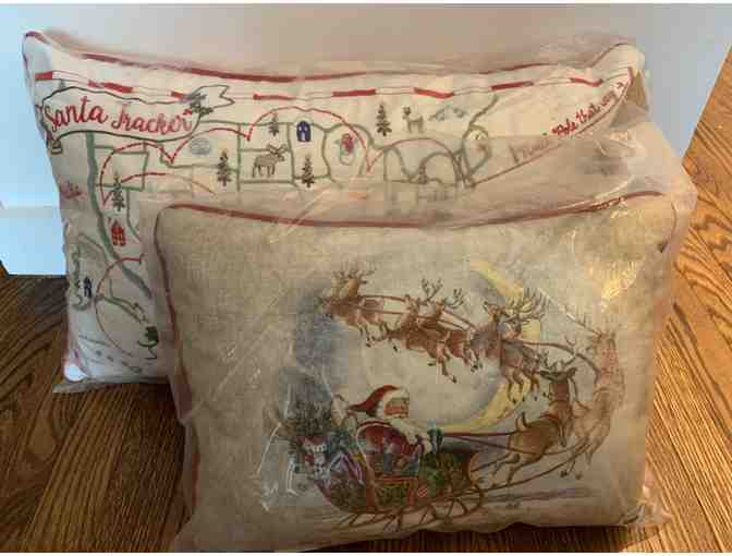 Two Santa Reindeer themed throw pillows