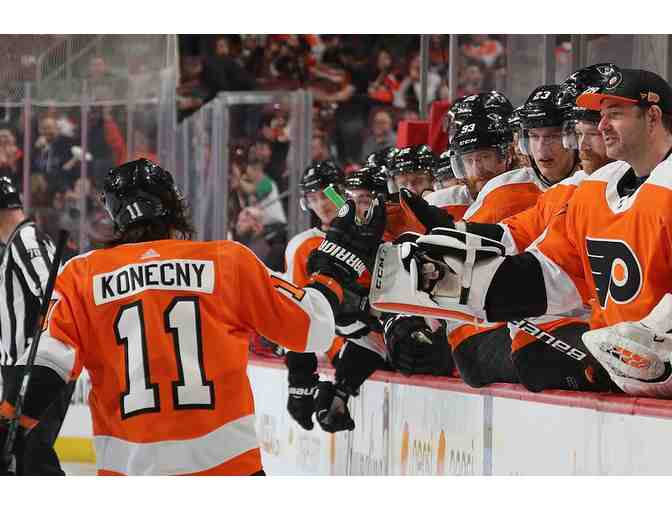 Between the Benches: Watch the Flyers from the Best Seat in the House! - Photo 1