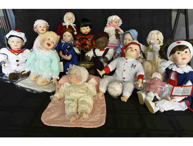 13 Porcelin Ashton Drake dolls