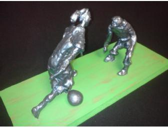 Clay Sculpture of Soccer Players