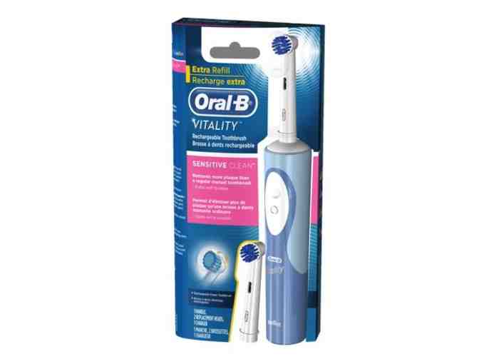 Oral-B Vitaity Braun Rechargeable Toothbrush-Trecker and Lopez