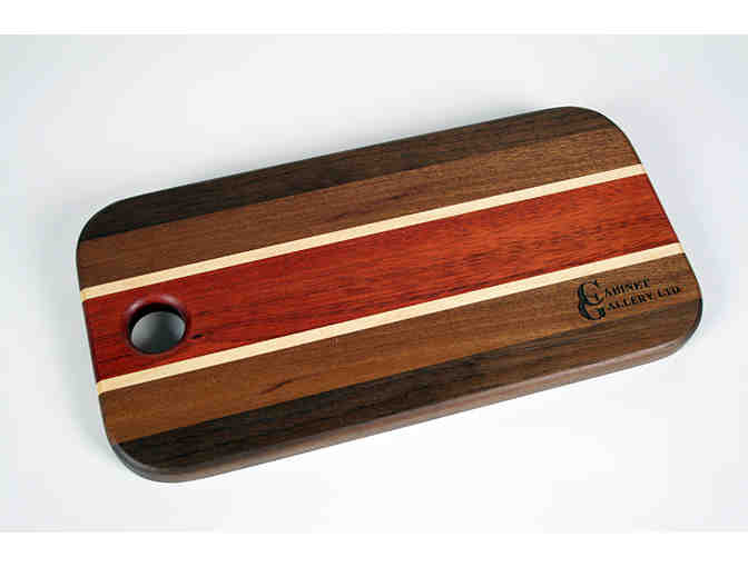Cutting board and $100 Gift card to Cabinet Gallery Ltd
