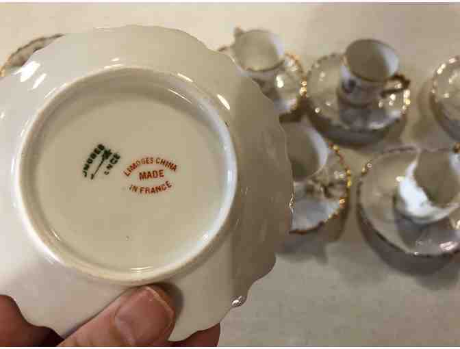 6 Porcelain Demitasse cups, saucers and 4 plates