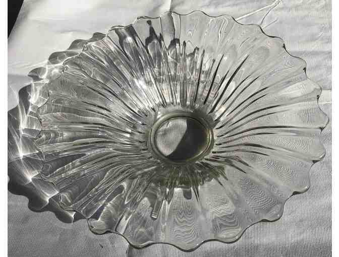 large glass flower shaped serving plate