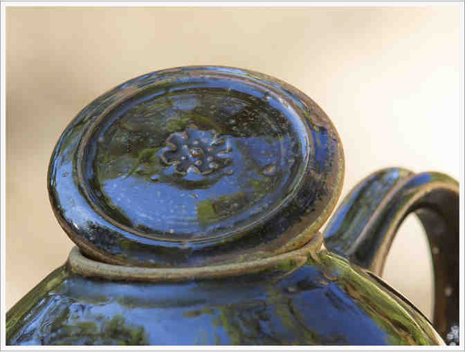 Timmokui Glaze teapot and two cups by Al Johnson.