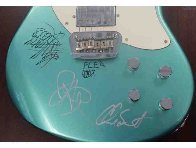 Electric Guitar signed by all members of the Red Hot Chili Peppers