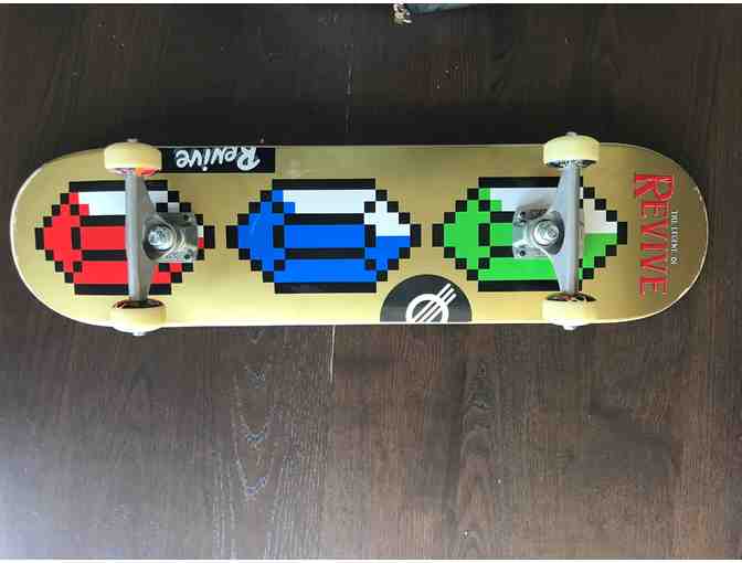 Revive Skateboard and Youth Helmet