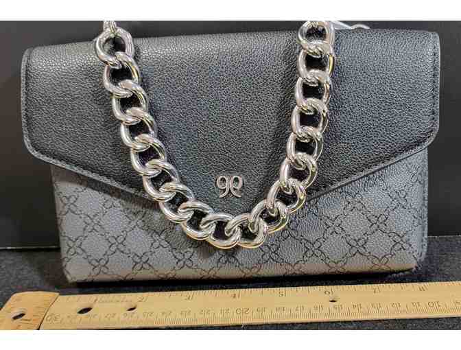 Black handbag with silver chain handle