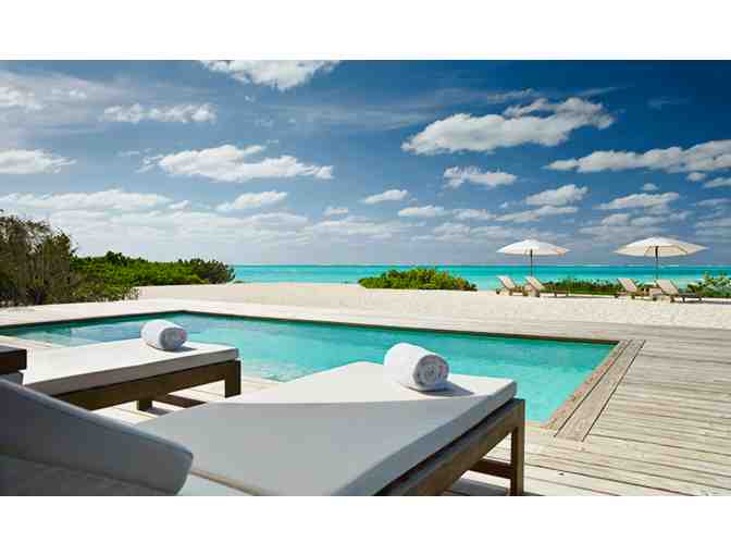 5 Nights in a 2-Bedroom Beach House at PARROT CAY Resort in Turks & Caicos w/AIRFARE for 4
