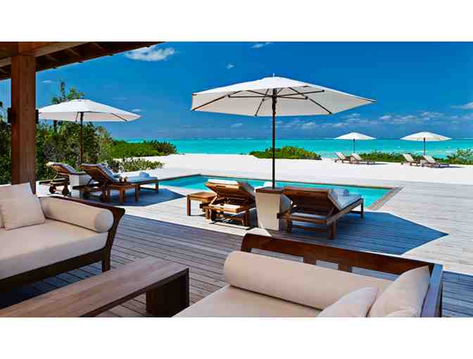 5 Nights in a 2-Bedroom Beach House at PARROT CAY Resort in Turks & Caicos w/AIRFARE for 4