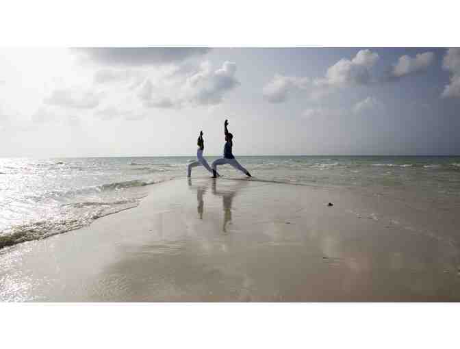 5 Nights in a 2-Bedroom Beach House at PARROT CAY Resort in Turks & Caicos w/AIRFARE for 4