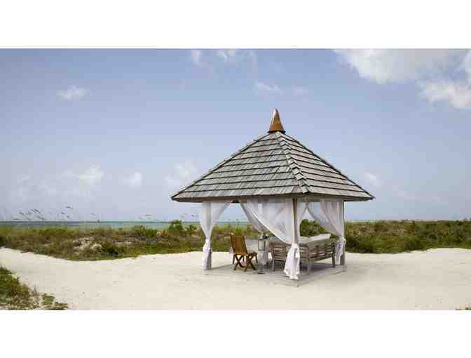 5 Nights in a 2-Bedroom Beach House at PARROT CAY Resort in Turks & Caicos w/AIRFARE for 4