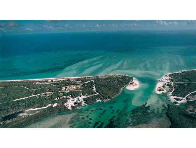 5 Nights in a 2-Bedroom Beach House at PARROT CAY Resort in Turks & Caicos w/AIRFARE for 4