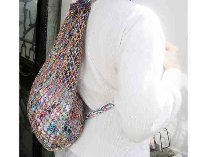 A Crocheted Backpack by Sandye Renz