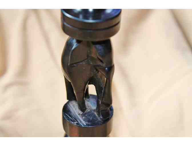 Pair of hand carved ebony elephant candlesticks