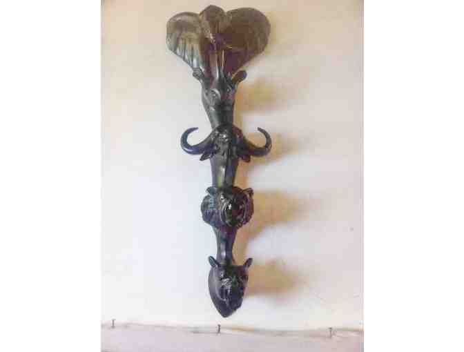 Animal heads ebony sculpture