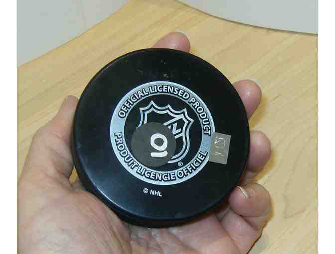 Hockey Puck SIGNED by Boston Bruins Player A. J. Greer