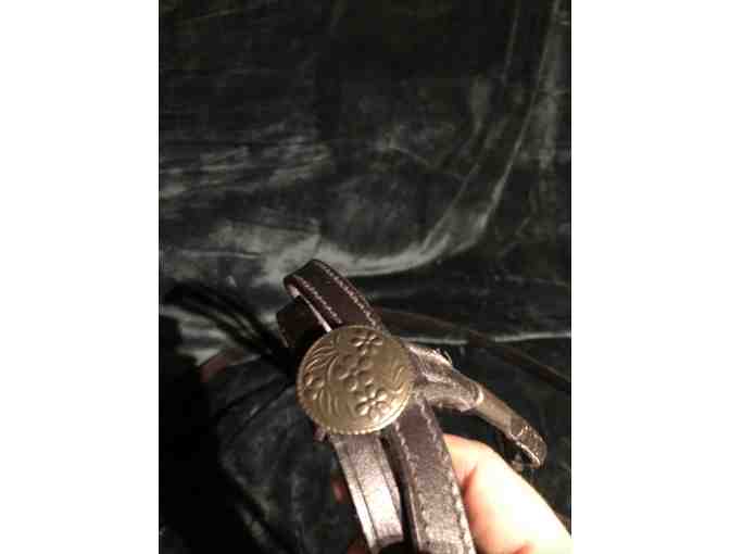 Vintage Western saddle with handcrafted tooled leather