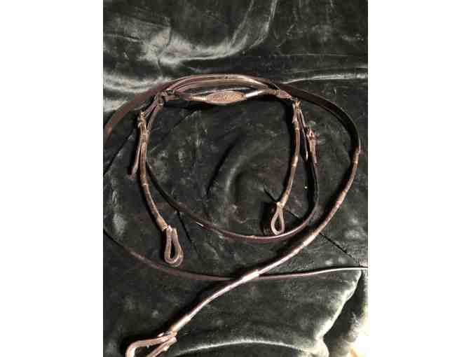 Vintage Western saddle with handcrafted tooled leather