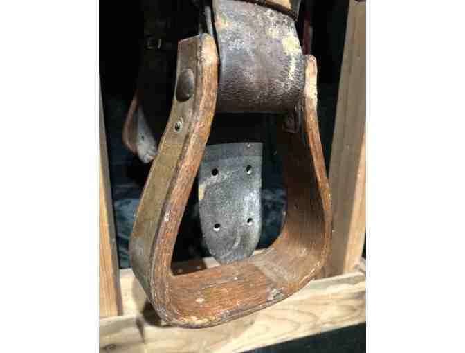 Vintage Western saddle with handcrafted tooled leather