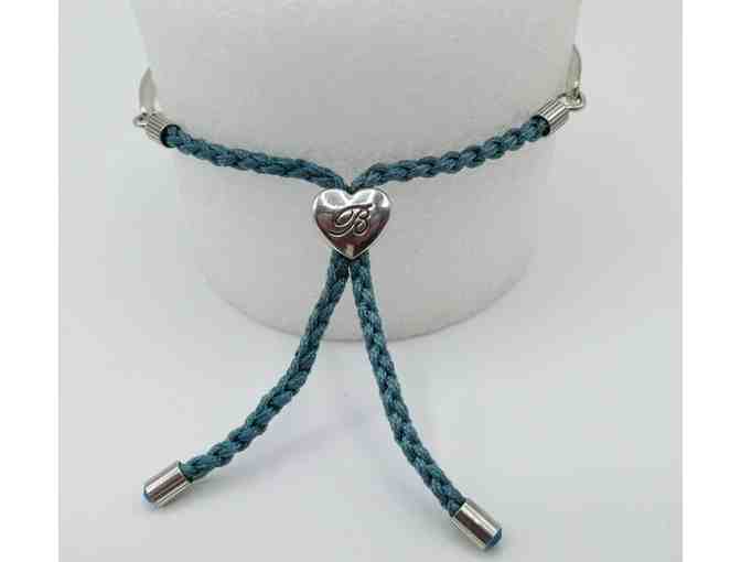 Brighton Silvertone And Blue Cord Colorcast Pull Bracelet, Compassion