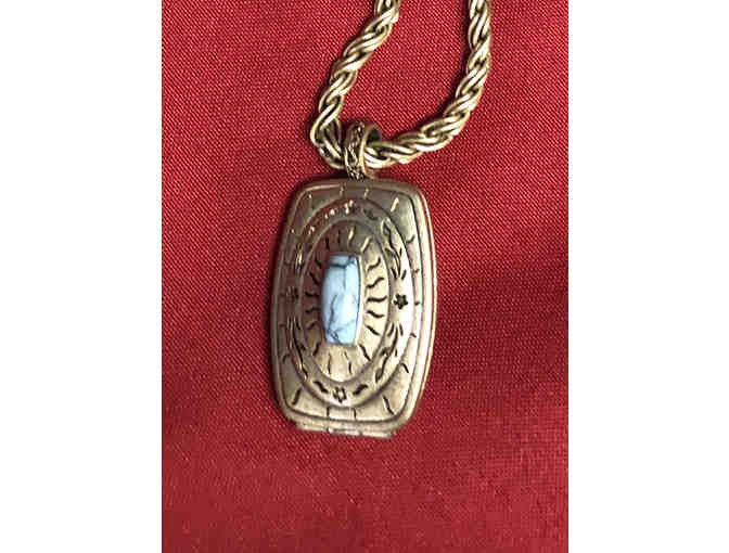 124- Concho style locket necklace