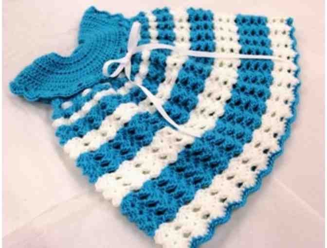 Hand-crocheted baby dress